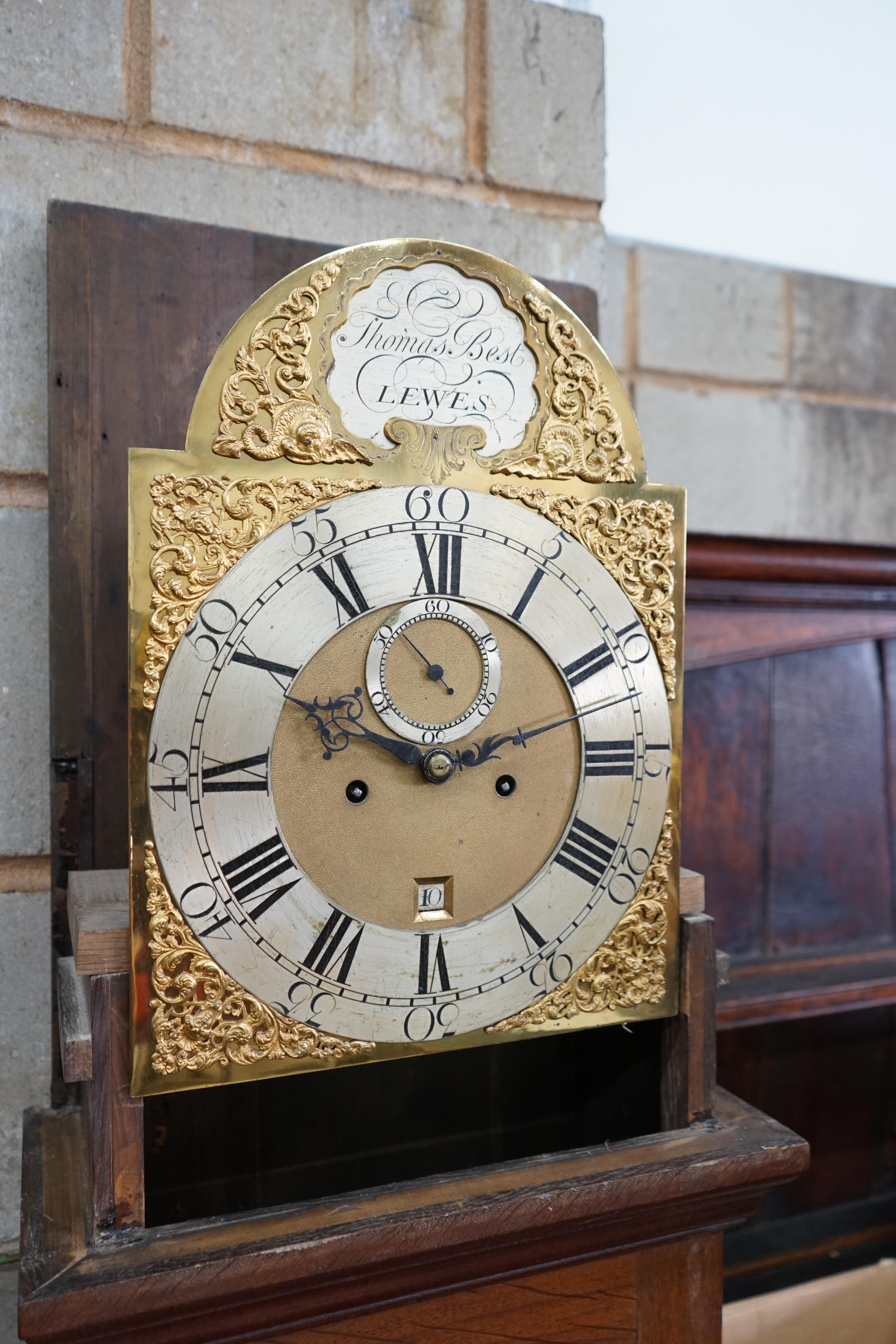 An early 19th century inlaid oak eight day longcase clock by Thomas Best, Lewes (no weights), height 211cm